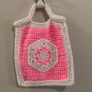 Hand made crochet purse with granny square and handles.